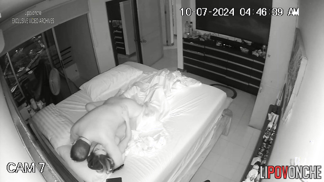 Tender kisses during missionary sex on the bed (cam in their room)