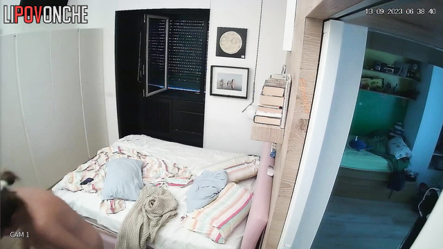 A man in glasses fucked his woman doggy style right on the bed