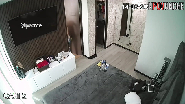A beautiful girl in seductive lingerie tenses up intensely during her orgasm