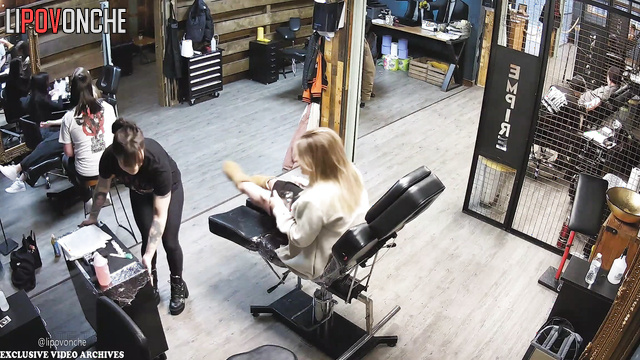 Blonde came to tattoo salon to make awesome tattoo