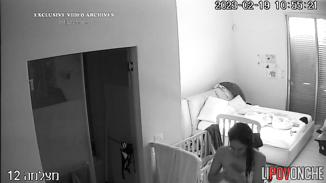 Topless brunette is preparing for the visit of guests