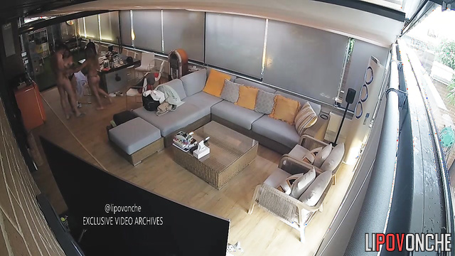 Two sexy girls rubbing their bodies against him