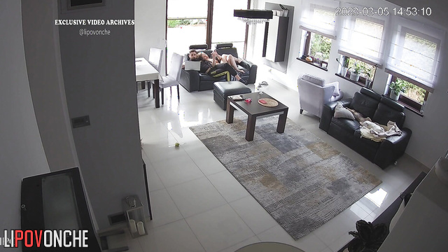Couple discussing their favorite movies in the living room
