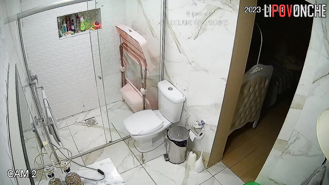 Chubby blonde peeing after hot masturbation (bathroom video)