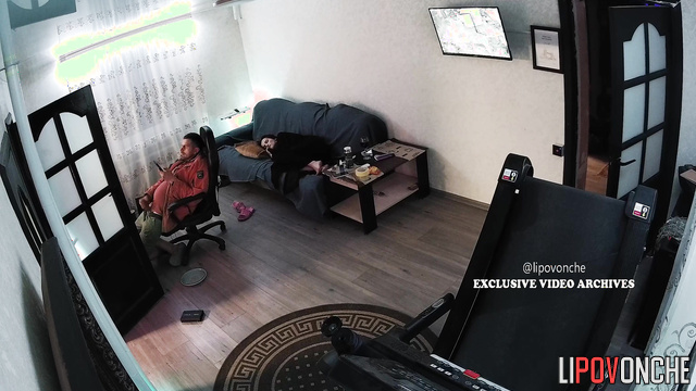 Guy jerking off on a lesbian porn while his wife is sleeping