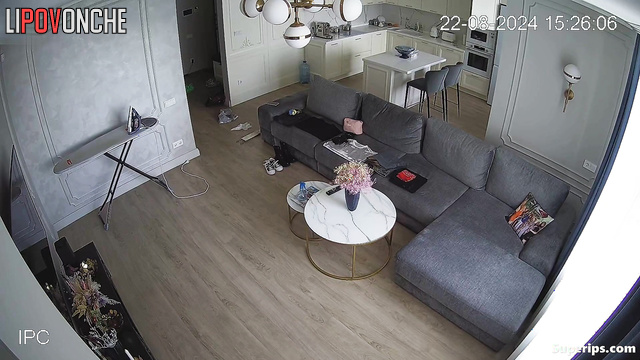 Blonde in underwear chatting on the sofa / hidden cam