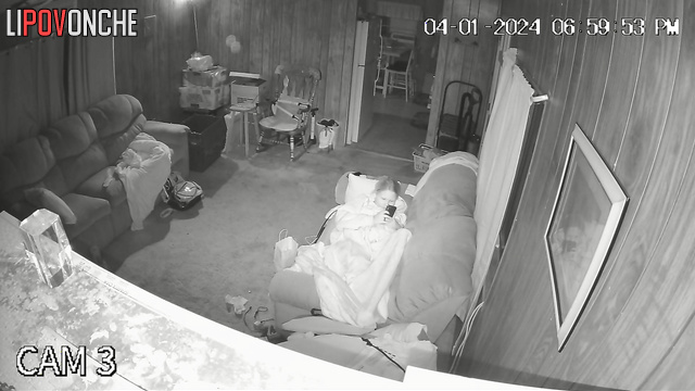 Blonde masturbating alone in the living room (live tape)