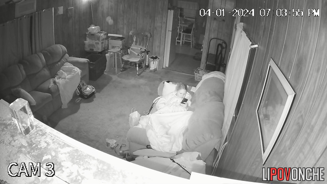 Blonde masturbating alone in the living room (live tape)