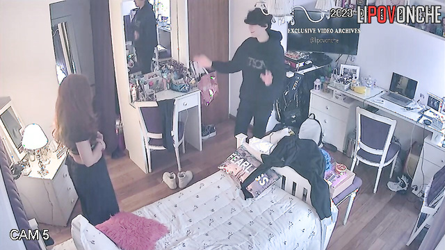 Horny teens kissing in the bedroom (parents are outside)