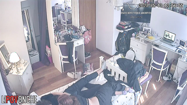 Horny teens kissing in the bedroom (parents are outside)