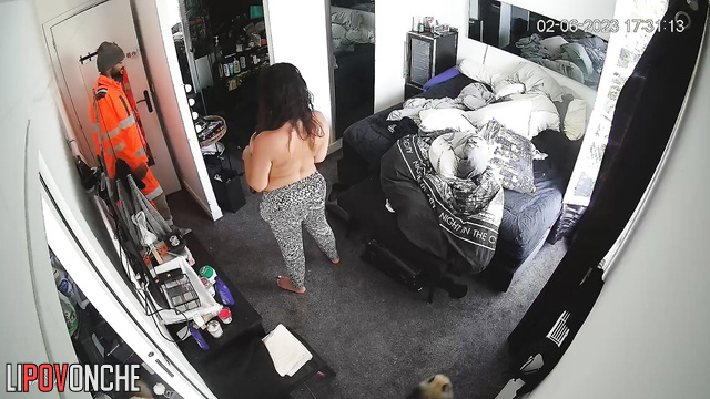 Brunette kissing her husband (he went from work)