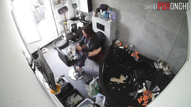 Brunette peeing and cutting his dog's hair (funny video)