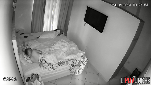 Couple tenderly hugging each other in their sleep
