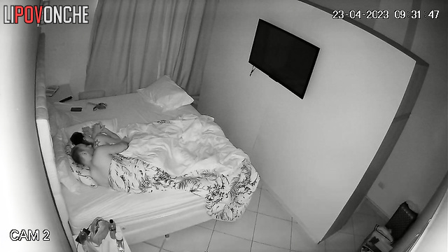 Couple tenderly hugging each other in their sleep