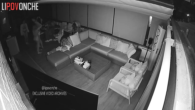 Topless babes and guy chatting in the living room