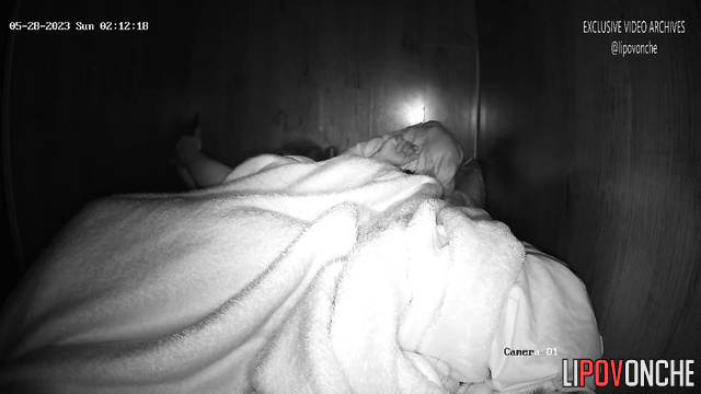 Asian couple relaxing on the bed (tender oral sex)