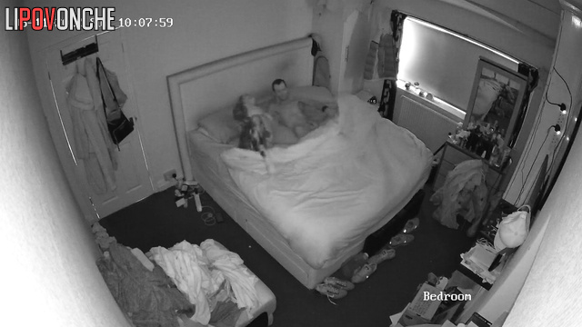 Tattooed cowgirl having fun in the bed with her skinny cowboy