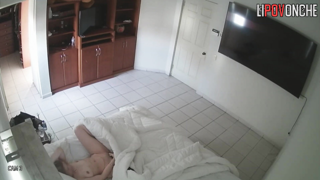 Naked woman masturbating and dreaming about a huge cock