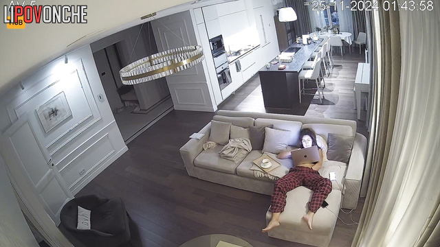 Single but sexy brunette masturbating in the living room
