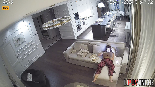 Single but sexy brunette masturbating in the living room