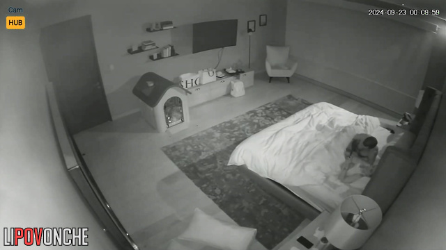 The wife is not distracted from looking at her phone as her husband fucks her.