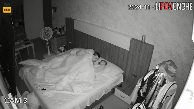 Naked couple spending good time in their cozy bed