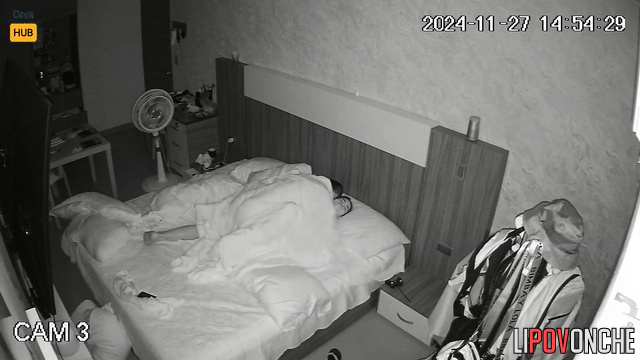 Naked couple spending good time in their cozy bed