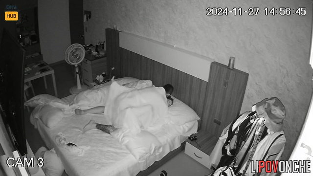 Naked couple spending good time in their cozy bed