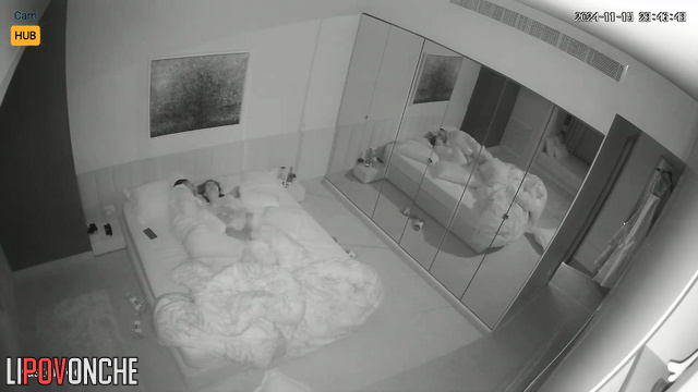 Couple enjoying each other in the room with huge mirrors