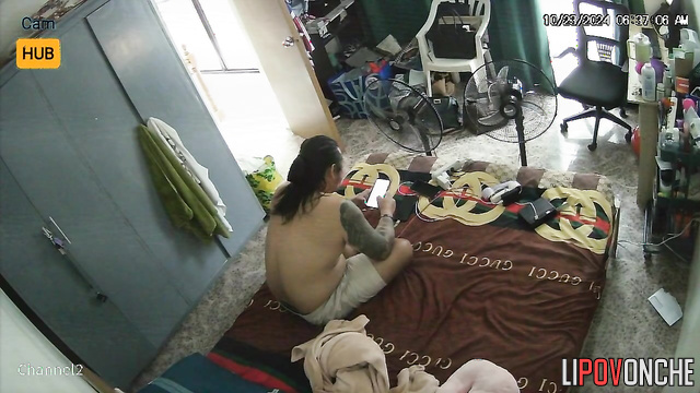Long-haired tattooed guy giving pleasure his wife
