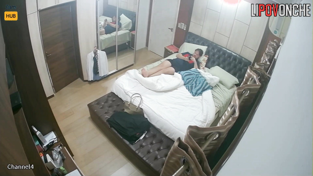 They enjoying missionary in 69 pose (it's reflected in the mirror)