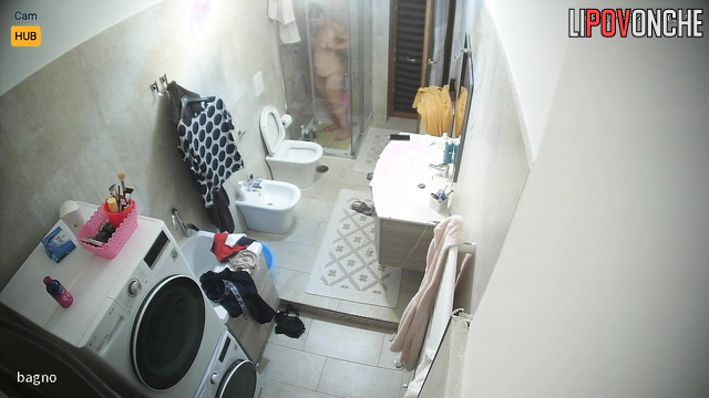 Chubby woman sitting on the toilet and listening to music