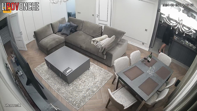 Blonde chilling on the sofa after took off her black heels