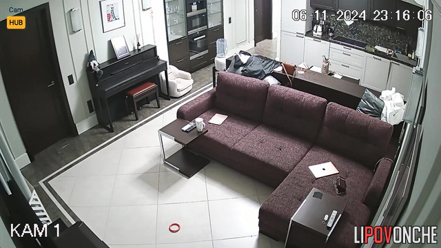 Russian girl with perfect body relaxing in a huge living room