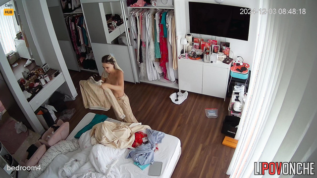 Busty blonde changing hot clothes in her huge room
