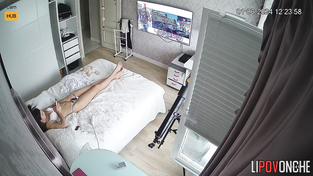 Sexy russian girl playing console in white underwear
