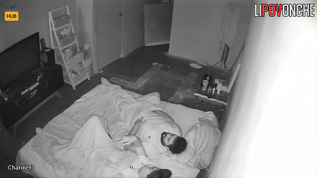 Bearded guy teasing her sweet girlfriend on the bed