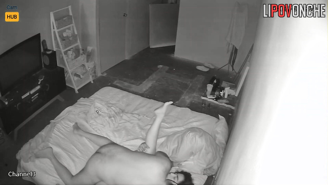 Bearded guy teasing her sweet girlfriend on the bed