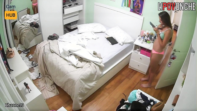 Skinny lady dressing to meet a friend - bedroom scene