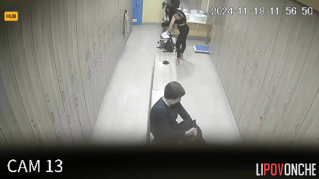 Milf and young woman dressing in the locker room