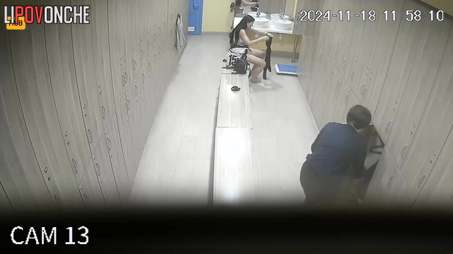 Milf and young woman dressing in the locker room