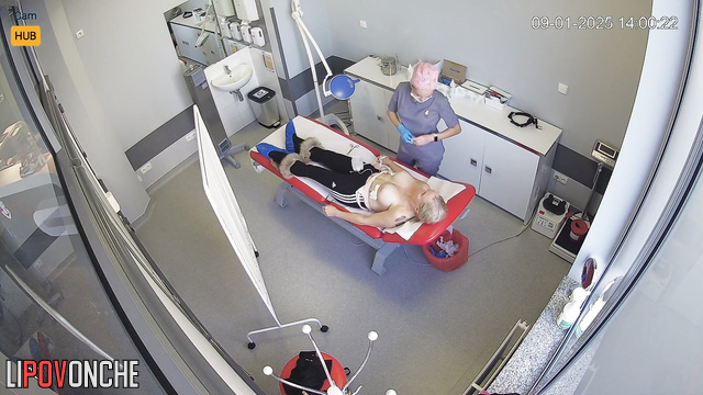 Boobs of this sexy blondie are about to get bigger (video from camera from clinic)