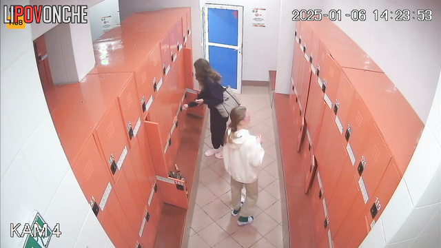 Girls put on swimming caps (hidden cam in locker room)