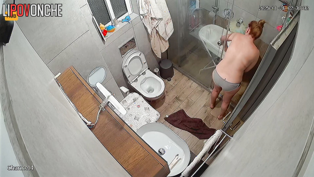 Topless redhead girl washing bed her close relative