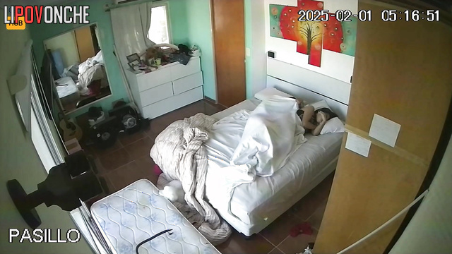 Argentine couple doing what they like best (bedroom)