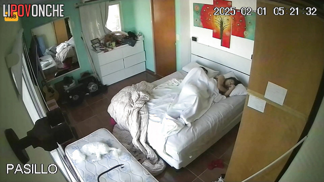 Argentine couple doing what they like best (bedroom)
