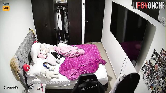 Long-haired brunette choosing clothes for evening