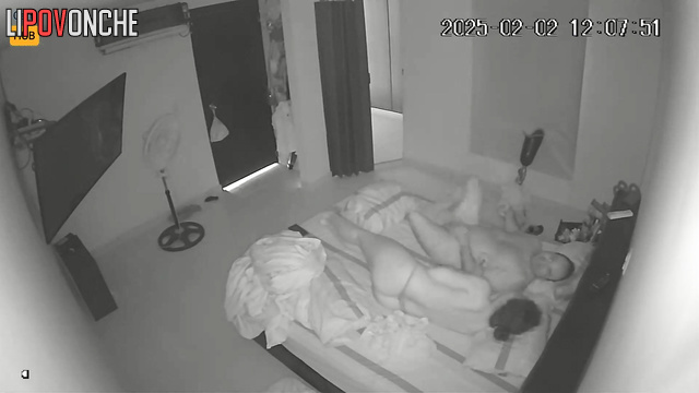 Young couple playing adult games in the cozy bedroom