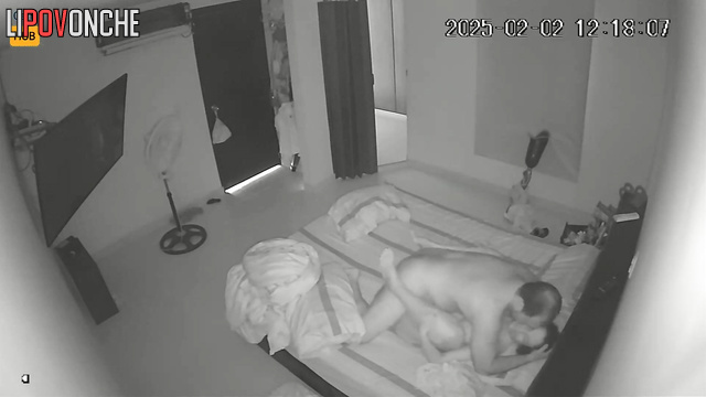 Young couple playing adult games in the cozy bedroom