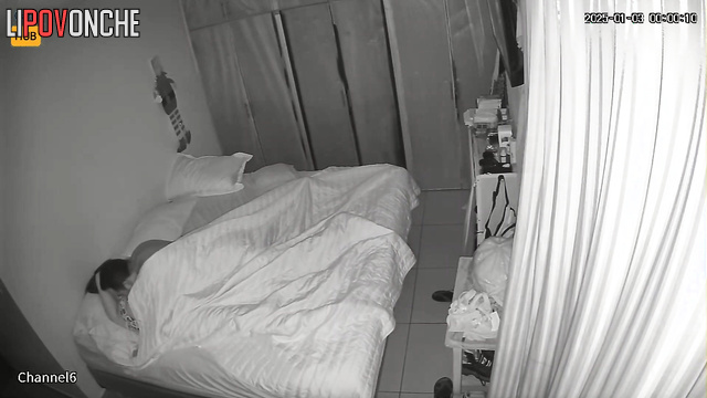 Hidden camera in the bedroom: Husband wakes up his Mexican wife for brief sex.